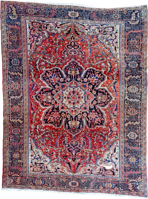 alt="Vintage Ahar Heriz carpet with red field and blue floral border" alt="Persian Heriz rug with central medallion and cream spandrels" alt="Northwest Iran rug with stylised floral design and bold medallion" alt="Traditional Heriz carpet from Ahar with red and blue color palette"