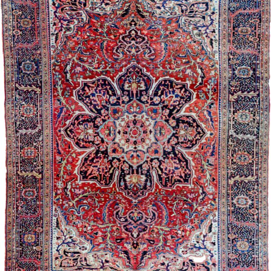 alt="Vintage Ahar Heriz carpet with red field and blue floral border" alt="Persian Heriz rug with central medallion and cream spandrels" alt="Northwest Iran rug with stylised floral design and bold medallion" alt="Traditional Heriz carpet from Ahar with red and blue color palette"