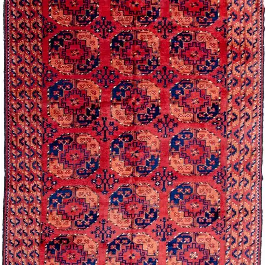 alt="Ersari carpet with soft red ground and octagonal guls" alt="Turkmen tribal rug with preserved end kilims and geometric borders" alt="Traditional Ersari rug with three rows of guls and soft wool" alt="Authentic Turkmen carpet with bold design and intact kilims"