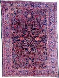 alt="Vintage Saruk carpet with blue field and stylised floral design" alt="Persian Saruk rug with purple floral border and swirling branches" alt="Elegant Saruk rug with high-quality wool and classic floral motifs" alt="Durable Persian carpet with blue background and rare purple border"