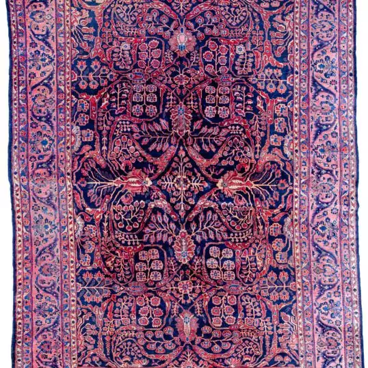 alt="Vintage Saruk carpet with blue field and stylised floral design" alt="Persian Saruk rug with purple floral border and swirling branches" alt="Elegant Saruk rug with high-quality wool and classic floral motifs" alt="Durable Persian carpet with blue background and rare purple border"
