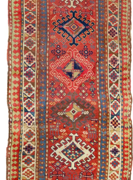 alt="Antique Shahsavan runner with red field and tribal medallions" alt="Persian tribal rug with geometric borders and charming motifs" alt="Long red Shahsavan corridor runner with bold tribal patterns" alt="Vintage Shahsavan runner with slight bend and rich colours"