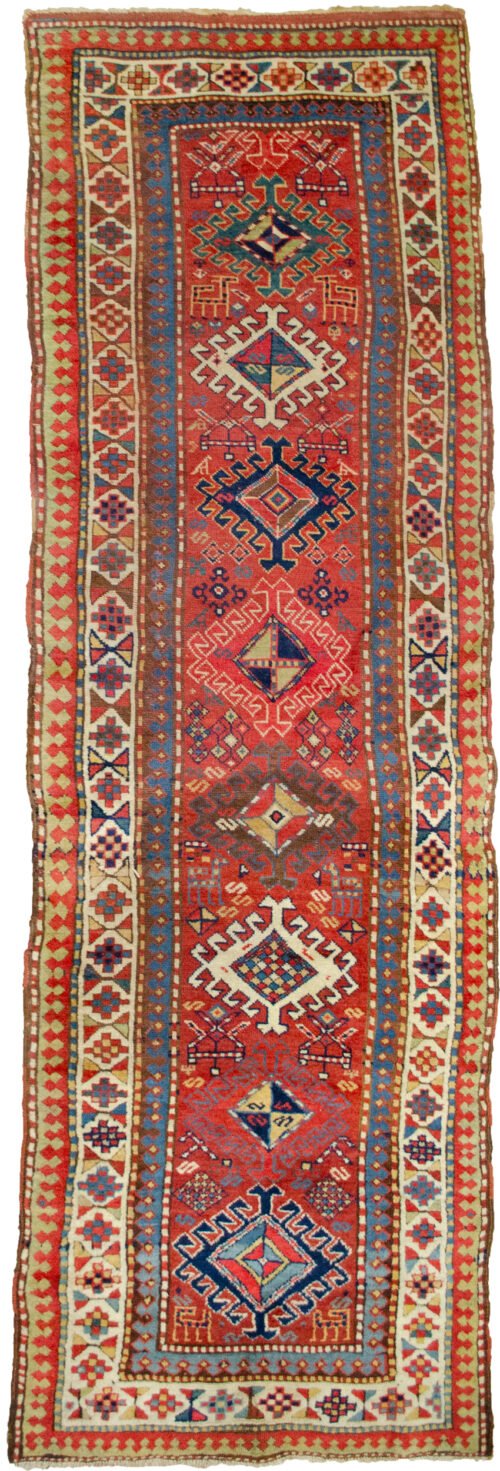 alt="Antique Shahsavan runner with red field and tribal medallions" alt="Persian tribal rug with geometric borders and charming motifs" alt="Long red Shahsavan corridor runner with bold tribal patterns" alt="Vintage Shahsavan runner with slight bend and rich colours"