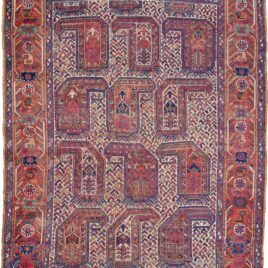 alt="Antique Khamseh rug with rare cream ground and stylised paisley" alt="Qashqai tribal rug from South Iran with terracotta geometric border" alt="Low-pile Persian rug with bush and tree motifs inside paisley design" alt="Vintage cream field Khamseh carpet with earthy tribal patterns"
