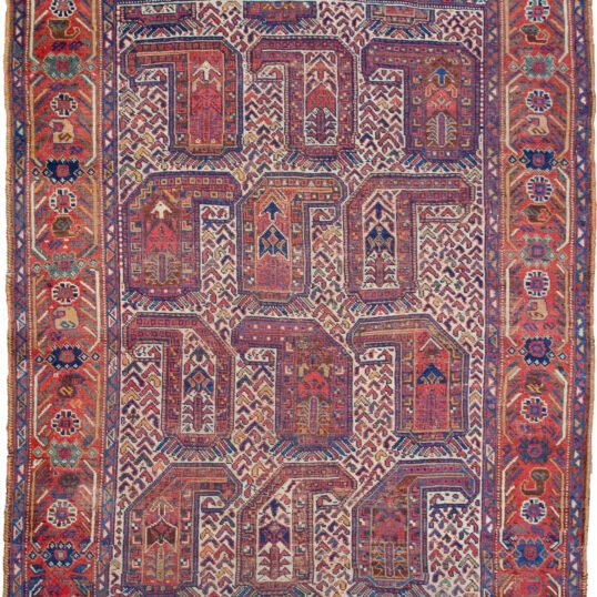 alt="Antique Khamseh rug with rare cream ground and stylised paisley" alt="Qashqai tribal rug from South Iran with terracotta geometric border" alt="Low-pile Persian rug with bush and tree motifs inside paisley design" alt="Vintage cream field Khamseh carpet with earthy tribal patterns"