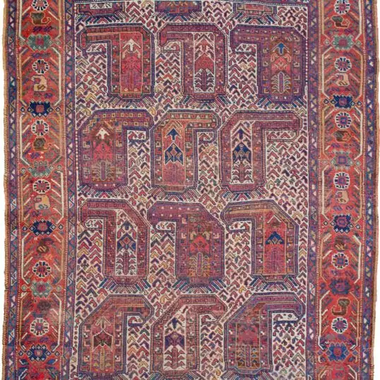 alt="Antique Khamseh rug with rare cream ground and stylised paisley" alt="Qashqai tribal rug from South Iran with terracotta geometric border" alt="Low-pile Persian rug with bush and tree motifs inside paisley design" alt="Vintage cream field Khamseh carpet with earthy tribal patterns"