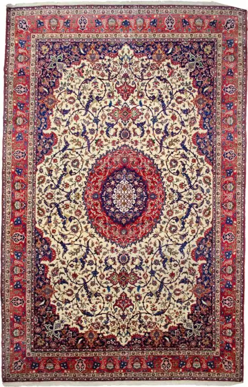 alt="Fine Isfahan carpet with cream field, red medallion, and indigo spandrels" alt="80 raj Persian rug with scrolling floral pattern and natural dyes" alt="High-knot density Isfahan carpet with red border and intricate floral motifs" alt="Exquisite Persian rug from Isfahan with over one million knots per square meter"
