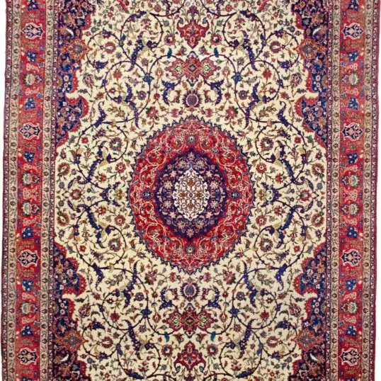 alt="Fine Isfahan carpet with cream field, red medallion, and indigo spandrels" alt="80 raj Persian rug with scrolling floral pattern and natural dyes" alt="High-knot density Isfahan carpet with red border and intricate floral motifs" alt="Exquisite Persian rug from Isfahan with over one million knots per square meter"