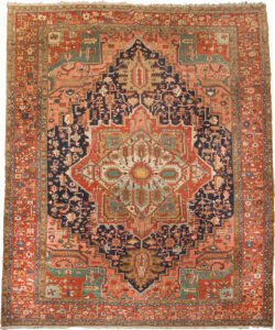 antique-heriz-carpet-blue-background.jpg heriz-carpet-medallion-design.jpg vibrant-spandrels-terracotta-border-heriz.jpg handwoven-heriz-carpet-natural-dyes.jpg