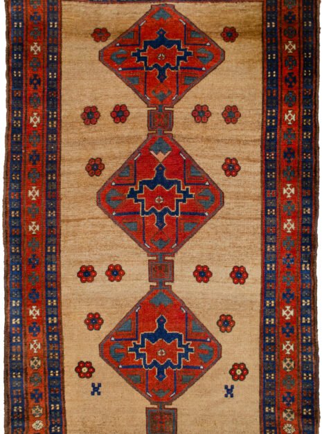 alt="Kordi carpet with camel field and triple medallion design" alt="Persian Kurdish rug with red floral border and blue guard borders" alt="Hand-knotted Kordi rug with flower head motifs and camel background" alt="Traditional Kurdish carpet from Iran with medallions and tribal detailing"