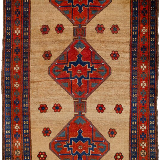 alt="Kordi carpet with camel field and triple medallion design" alt="Persian Kurdish rug with red floral border and blue guard borders" alt="Hand-knotted Kordi rug with flower head motifs and camel background" alt="Traditional Kurdish carpet from Iran with medallions and tribal detailing"