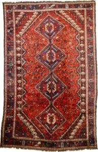 alt="Khamseh tribal rug with burnt oak field and peacock motifs" alt="Handwoven Persian rug with chickens, floral medallions, and paisley border" alt="Southwest Iran tribal rug featuring animal symbols and navy border" alt="Decorative Khamseh rug with intricate medallions and storytelling motifs"