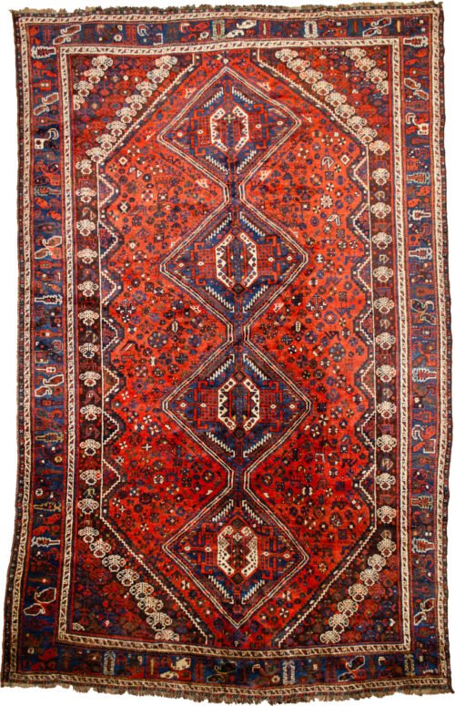 alt="Khamseh tribal rug with burnt oak field and peacock motifs" alt="Handwoven Persian rug with chickens, floral medallions, and paisley border" alt="Southwest Iran tribal rug featuring animal symbols and navy border" alt="Decorative Khamseh rug with intricate medallions and storytelling motifs"