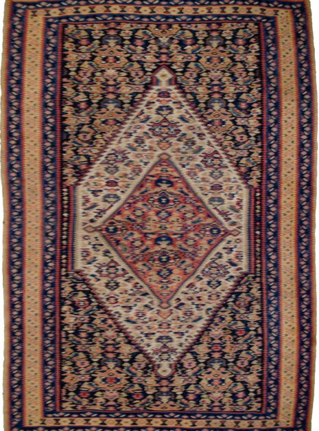 alt="Antique Senneh kilim with blue and yellow floral border and fine weave" alt="Persian flatweave rug from Senneh with original wall-hanging rings" alt="Well-preserved antique Senneh kilim in vibrant blues and yellows" alt="Collector’s Persian kilim with floral motifs and exceptional condition"