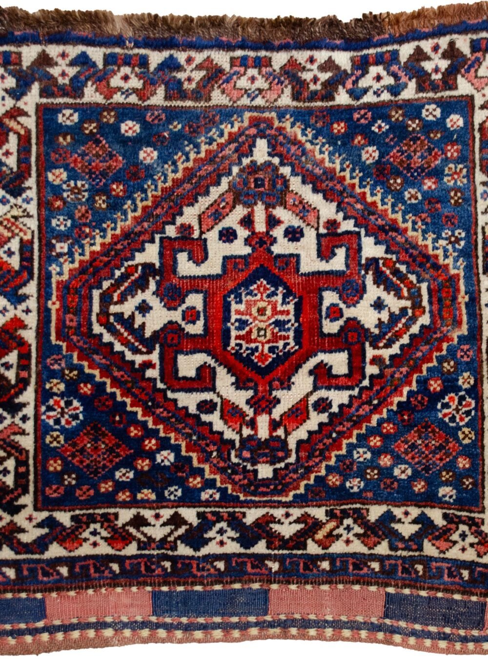 alt="Qashqai kilim bag with light blue background and cream medallion" alt="Tribal Persian bag with scarab beetle motif and floral kilim design" alt="Handwoven Qashqai bag featuring blue field and symbolic medallion" alt="Vintage Qashqai kilim with cream border and central scarab motif"