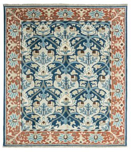 alt="Hand-knotted William Morris inspired rug with blue floral design and squarish format" alt="Arts and Crafts movement carpet with floral motifs and natural dyes" alt="Blue field William Morris style rug with heirloom craftsmanship" alt="William Morris carpet reproduction with Turkish knot and floral border"