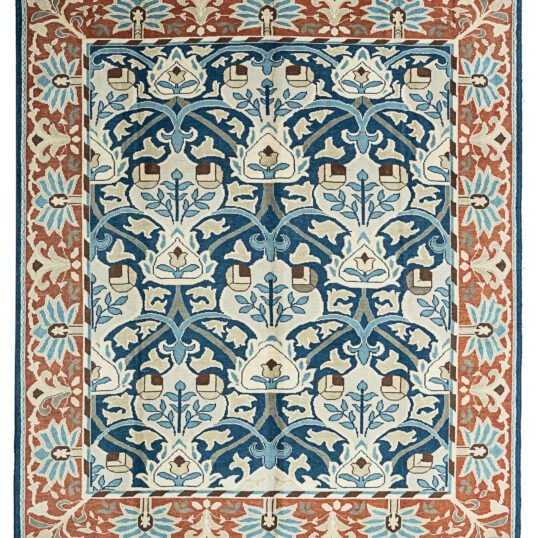 alt="Hand-knotted William Morris inspired rug with blue floral design and squarish format" alt="Arts and Crafts movement carpet with floral motifs and natural dyes" alt="Blue field William Morris style rug with heirloom craftsmanship" alt="William Morris carpet reproduction with Turkish knot and floral border"