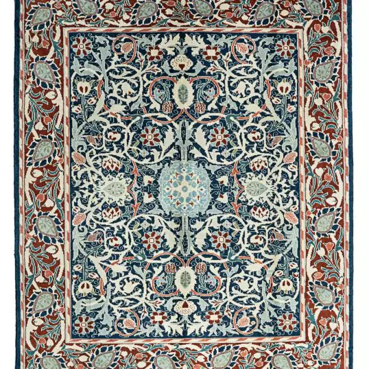 alt="Hand-knotted William Morris Holland Park carpet with blue background and red floral border" alt="Floral William Morris carpet design with red border and intricate flowers" alt="Handwoven Arts and Crafts carpet inspired by Holland Park design" alt="Morris-inspired rug with blue field, red border, and intricate floral motifs"