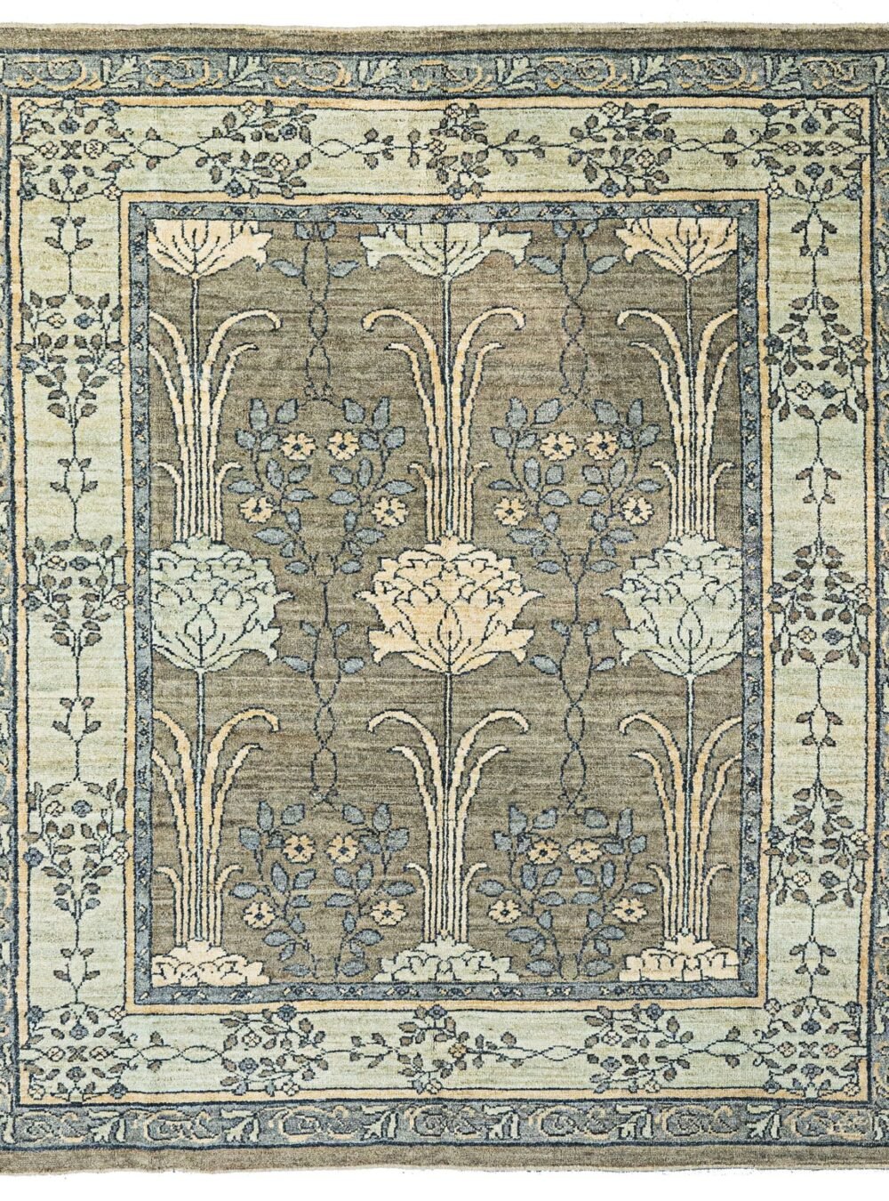 alt="Charles Voysey-inspired hand-knotted rug with large floral design and greyish field" alt="Floral Charles Voysey design handwoven carpet with expressive flowers and stems" alt="Soft grey carpet with Voysey floral motifs, hand-knotted from high-quality wool" alt="High-quality wool rug with natural dyes in Charles Voysey style featuring graceful flowers and stems"