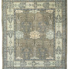 alt="Charles Voysey-inspired hand-knotted rug with large floral design and greyish field" alt="Floral Charles Voysey design handwoven carpet with expressive flowers and stems" alt="Soft grey carpet with Voysey floral motifs, hand-knotted from high-quality wool" alt="High-quality wool rug with natural dyes in Charles Voysey style featuring graceful flowers and stems"