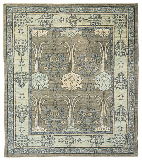 alt="Charles Voysey-inspired hand-knotted rug with large floral design and greyish field" alt="Floral Charles Voysey design handwoven carpet with expressive flowers and stems" alt="Soft grey carpet with Voysey floral motifs, hand-knotted from high-quality wool" alt="High-quality wool rug with natural dyes in Charles Voysey style featuring graceful flowers and stems"