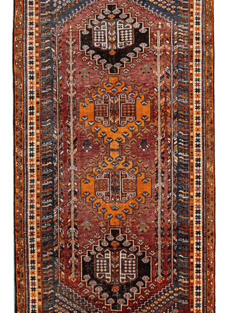 alt="Hand-knotted Qashqai rug with rich red background and four medallions" alt="Tribal Qashqai rug with intricate cream and orange borders" alt="Qashqai rug with blue-grey spandrels and stunning red hue" alt="Pre-owned Qashqai tribal rug featuring bold geometric designs and vibrant colors"