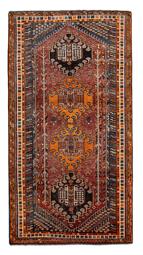alt="Hand-knotted Qashqai rug with rich red background and four medallions" alt="Tribal Qashqai rug with intricate cream and orange borders" alt="Qashqai rug with blue-grey spandrels and stunning red hue" alt="Pre-owned Qashqai tribal rug featuring bold geometric designs and vibrant colors"