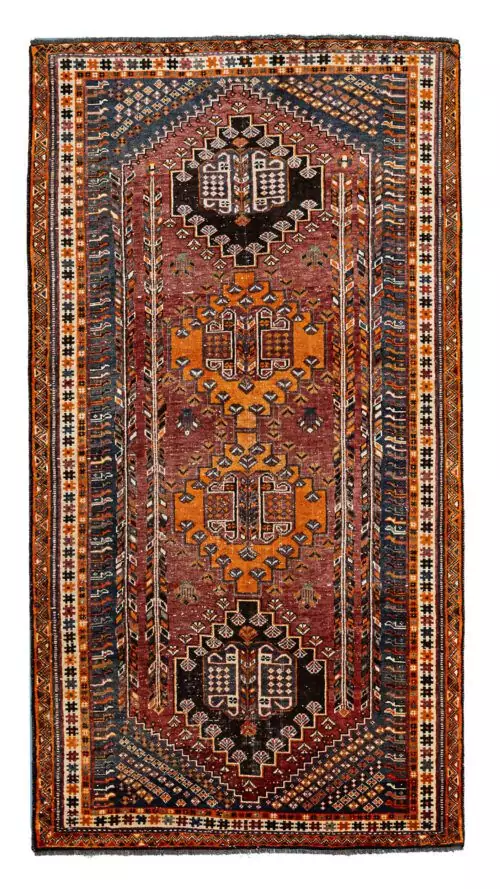 alt="Hand-knotted Qashqai rug with rich red background and four medallions" alt="Tribal Qashqai rug with intricate cream and orange borders" alt="Qashqai rug with blue-grey spandrels and stunning red hue" alt="Pre-owned Qashqai tribal rug featuring bold geometric designs and vibrant colors"