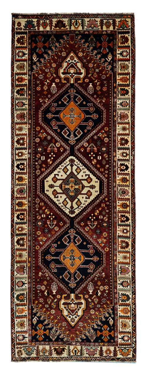 alt="Hand-knotted Qashqai tribal runner with scarab medallions and tribal motifs" alt="Burgundy Qashqai runner with cream floral border and tribal designs" alt="Qashqai runner with rich burgundy background and intricate tribal motifs" alt="Rare Qashqai runner featuring scarab medallions and nature-inspired border"