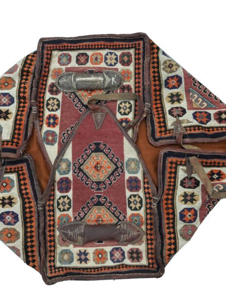 alt="Vintage Qashqai Mafrash with handwoven kilim and original leather straps" alt="Tribal storage chest from southern Iran with geometric kilim motifs" alt="Authentic Qashqai Mafrash used for bedding storage with decorative patterns" alt="Persian nomadic textile box featuring vibrant tribal weaving and leather handles"