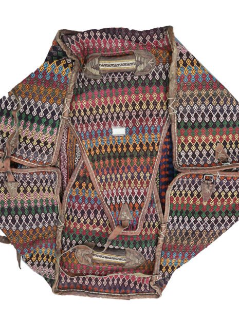 alt="Antique Qashqai Mafrash with kilim panels and leather straps" alt="Persian tribal storage chest with geometric kilim motifs" alt="Handwoven Qashqai bedding bag with vibrant tribal designs" alt="Qashqai Mafrash used as decorative storage trunk with original handles"