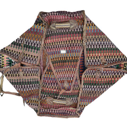 alt="Antique Qashqai Mafrash with kilim panels and leather straps" alt="Persian tribal storage chest with geometric kilim motifs" alt="Handwoven Qashqai bedding bag with vibrant tribal designs" alt="Qashqai Mafrash used as decorative storage trunk with original handles"