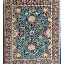 alt="Hand-knotted William Morris Holland Park carpet with vibrant floral motifs and deep red background" alt="Arts and Crafts rug with floral design, inspired by William Morris" alt="Handmade William Morris rug featuring large flower heads and flowing stems" alt="William Morris-inspired floral rug with red background and intricate details"