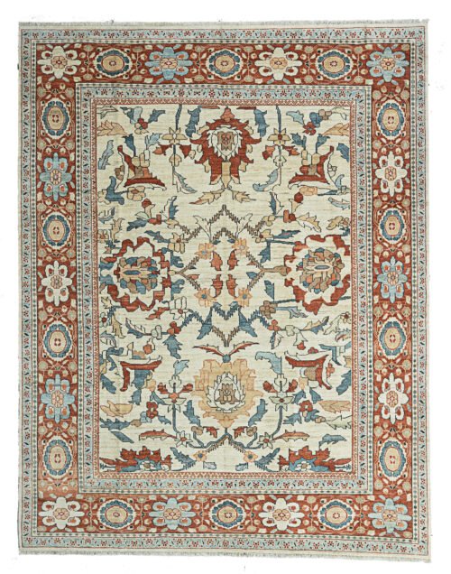 alt="Sultanabad carpet with cream field and large floral medallions in blue and red" alt="Handwoven Sultanabad rug with red border and light blue guard borders" alt="Traditional Persian carpet with stylized flower heads and natural dye colors" alt="Cream background Sultanabad carpet with handspun wool and floral design"