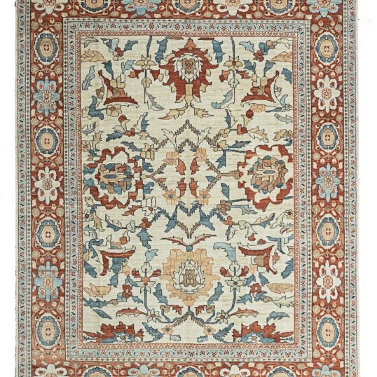 alt="Sultanabad carpet with cream field and large floral medallions in blue and red" alt="Handwoven Sultanabad rug with red border and light blue guard borders" alt="Traditional Persian carpet with stylized flower heads and natural dye colors" alt="Cream background Sultanabad carpet with handspun wool and floral design"