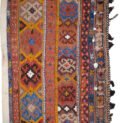 alt="Large Afshar tribal bag with terracotta and blue borders from southern Iran" alt="Afshar bagface with intricate tribal motifs and intact locks" alt="Oversized vintage Afshar rug bag with three motif bands and light blue frame" alt="Decorative Persian tribal bag with traditional Afshar weaving"