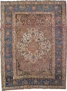 alt="Vintage Khamseh rug with cream medallion and floral motifs on reddish-brown field" alt="Persian carpet with cypress tree border and Bakhtiari-influenced design" alt="Handwoven squarish Khamseh rug with blue border and beige field" alt="Unique Persian rug with geometric guard borders and soft floral elements"