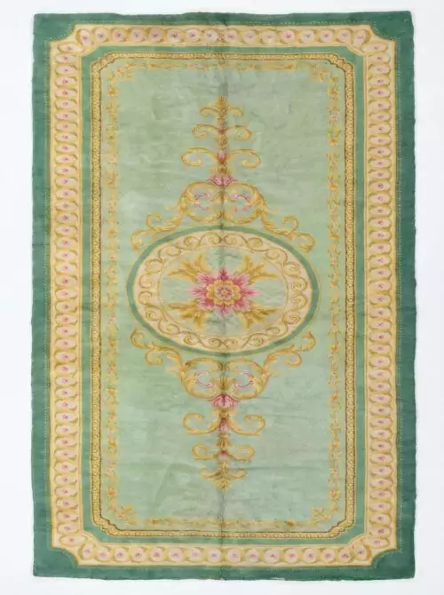 A full, direct overhead view of the Hand-Knotted Vintage Spanish Rug 1950s Deep Green against a white background. This shot clearly displays the 639 x 295cm dimensions, the central floral medallion, the light green field, and the thick, ornate dark green border with gold detailing.