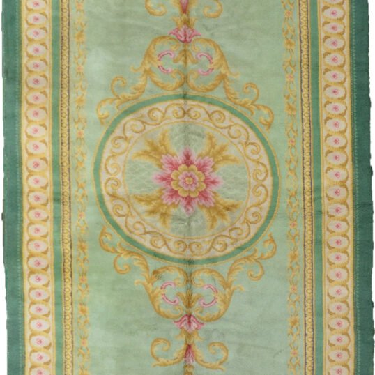 alt="Vintage Spanish carpet with deep green field and cream and gold border" alt="Handwoven Spanish rug featuring a central medallion and classic pattern" alt="Elegant green vintage rug with aristocratic design and traditional motifs" alt="Large Spanish carpet with central medallion and refined border details"