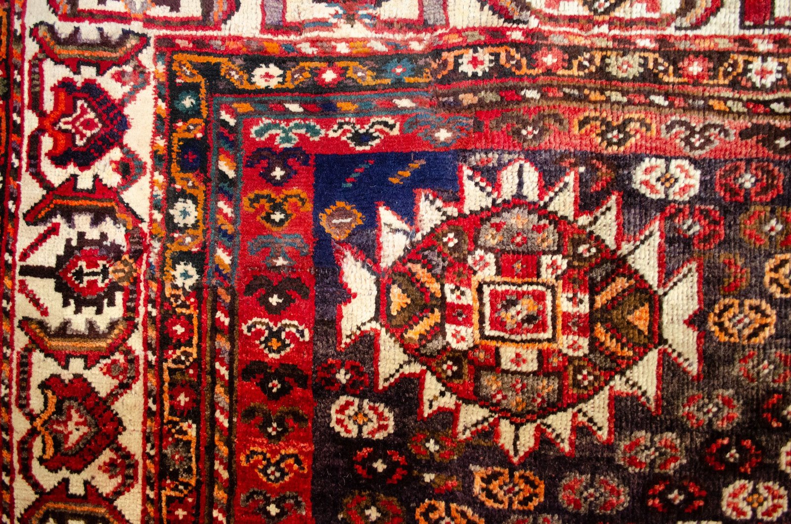 13450-Old-repair shiraz-nomadic-medallion-rug-red-blue.jpg