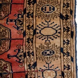 soft-red-tribal-carpet-with-cream-border