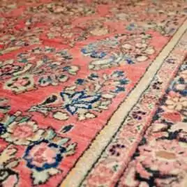 antique-saruk-style-floral-carpet-indigo-border.jpg