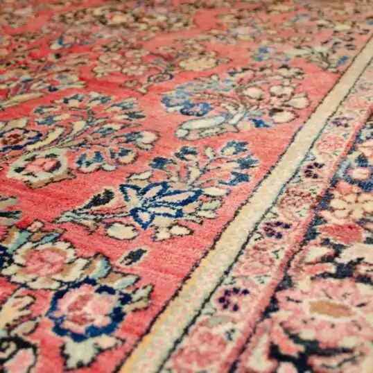 antique-saruk-style-floral-carpet-indigo-border.jpg