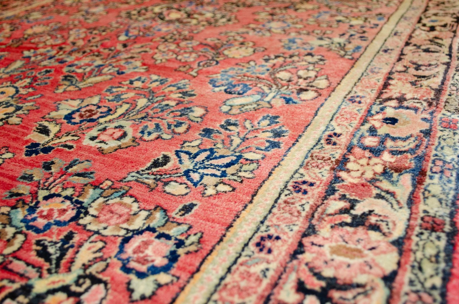 H384-Angle antique-saruk-style-floral-carpet-indigo-border.jpg