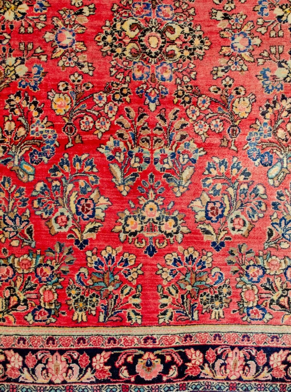 H384-Close-up1 antique-saruk-style-floral-carpet-indigo-border.jpg