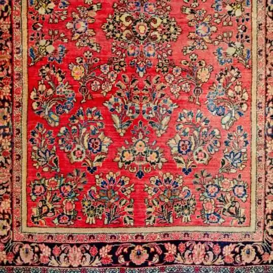 antique-saruk-style-floral-carpet-indigo-border.jpg