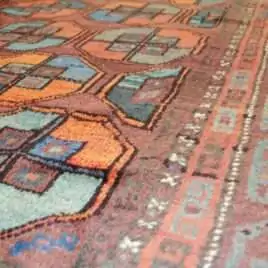 tribal-persian-rug-with-wide-kilim-ends.jpg