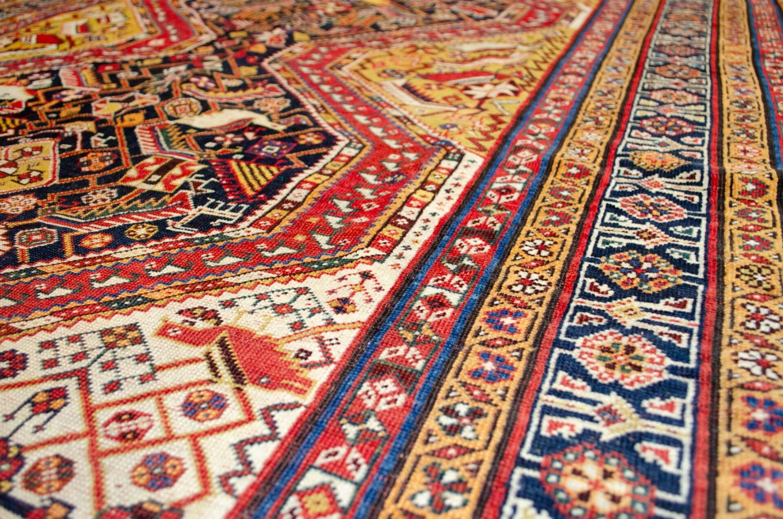 H388-Angle triple-medallion-tribal-persian-rug.jpg