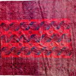rich-red-elephant-foot-tribal-rug.jpg