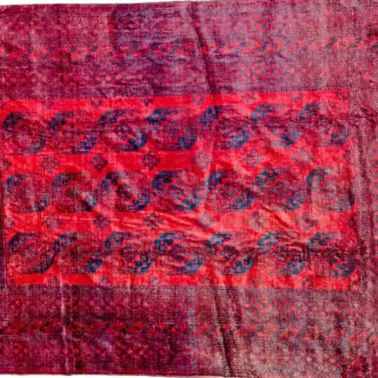 rich-red-elephant-foot-tribal-rug.jpg